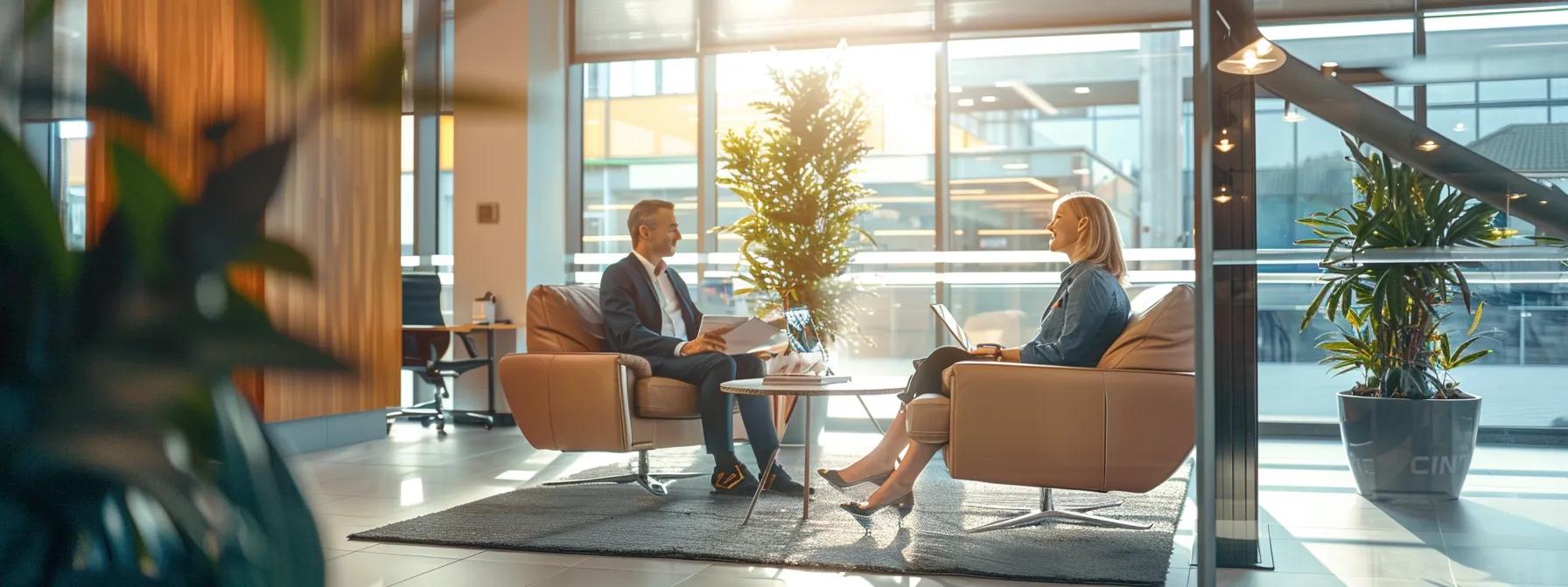 Modern office interior with two professionals discussing cannabis insurance options, emphasizing the importance of tailored coverage for operational risks.